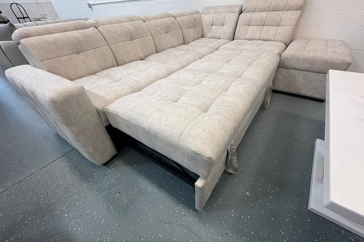 European sleeper sectional that converts into a bed